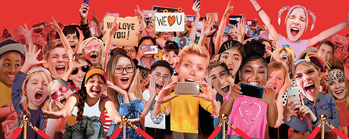Fans cheer and take photos of a celebrity