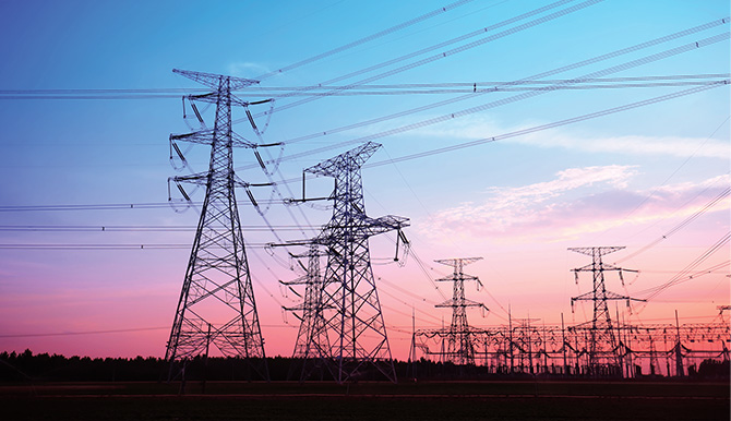 Enlargeable illustration of power lines at dusk