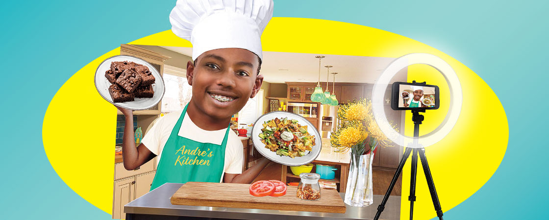 Image of a kid chef filming themselves cooking in the kitchen