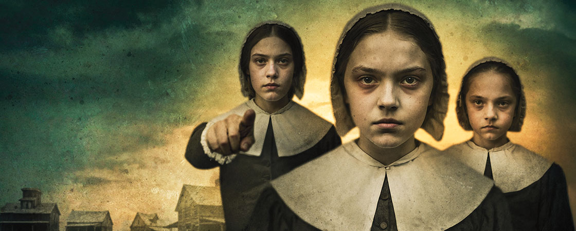 Image of three young townspeople